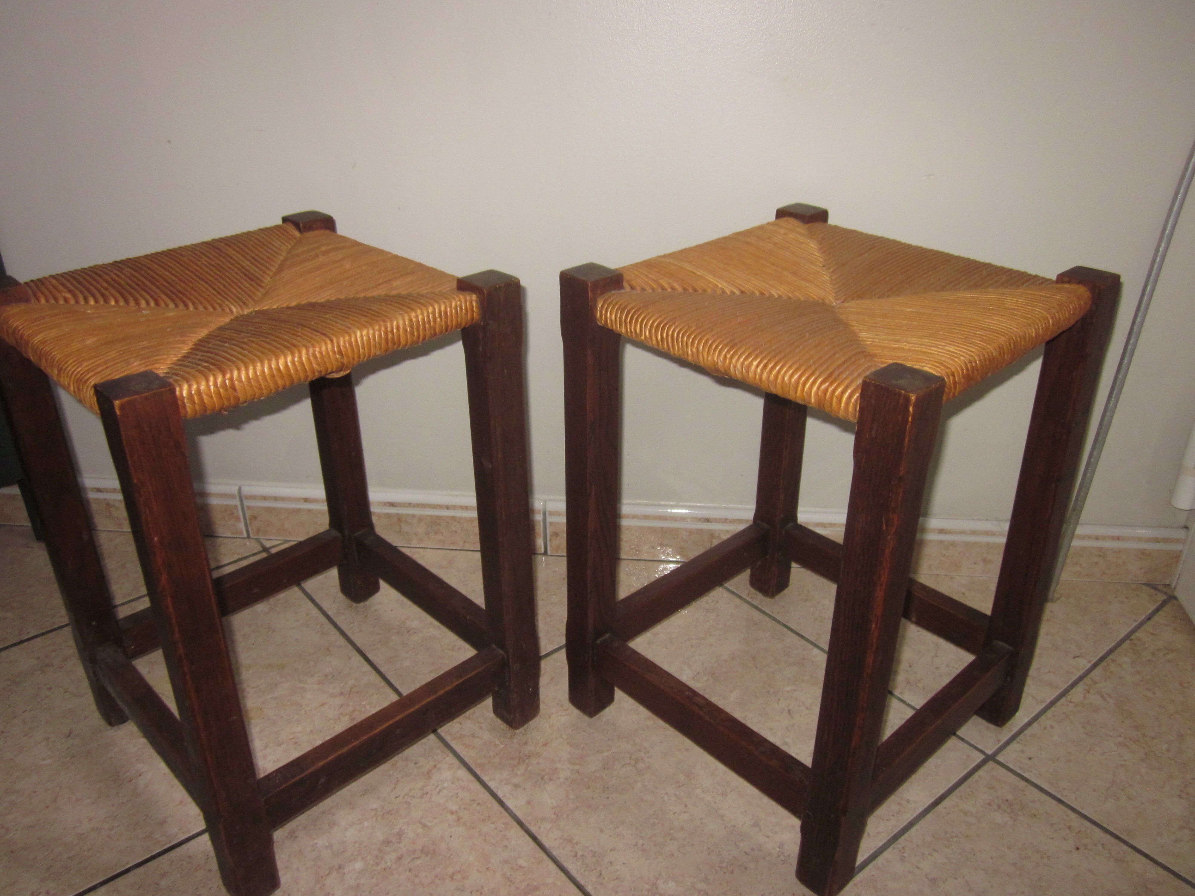 Pair of wooden and straw stools