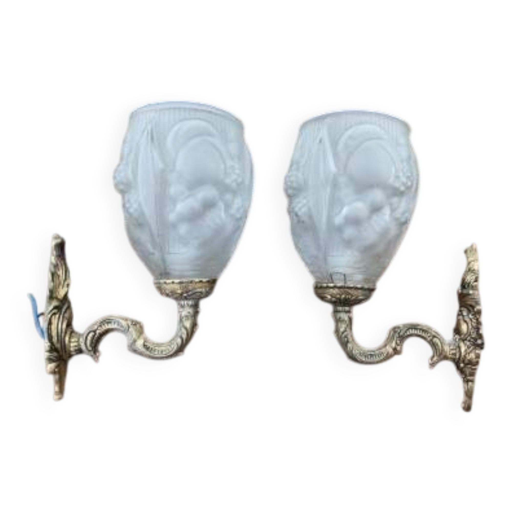 Pair of brass wall lights and glass paste.