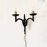 Wrought iron wall lights.