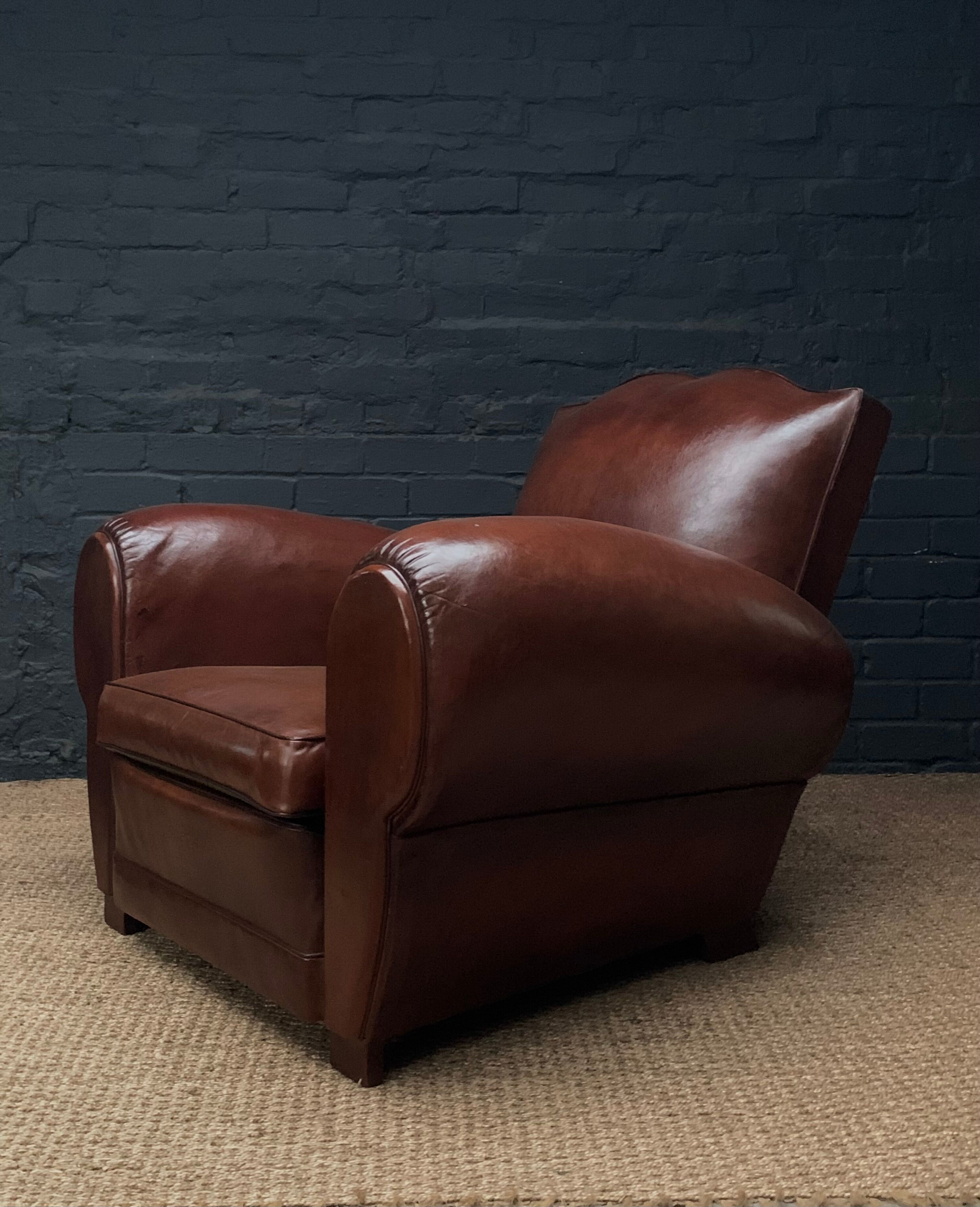 Leather club chair, havana moustache model, with cuban cigar arms, circa 1930's