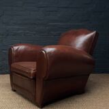 Leather club chair, havana moustache model, with cuban cigar arms, circa 1930's