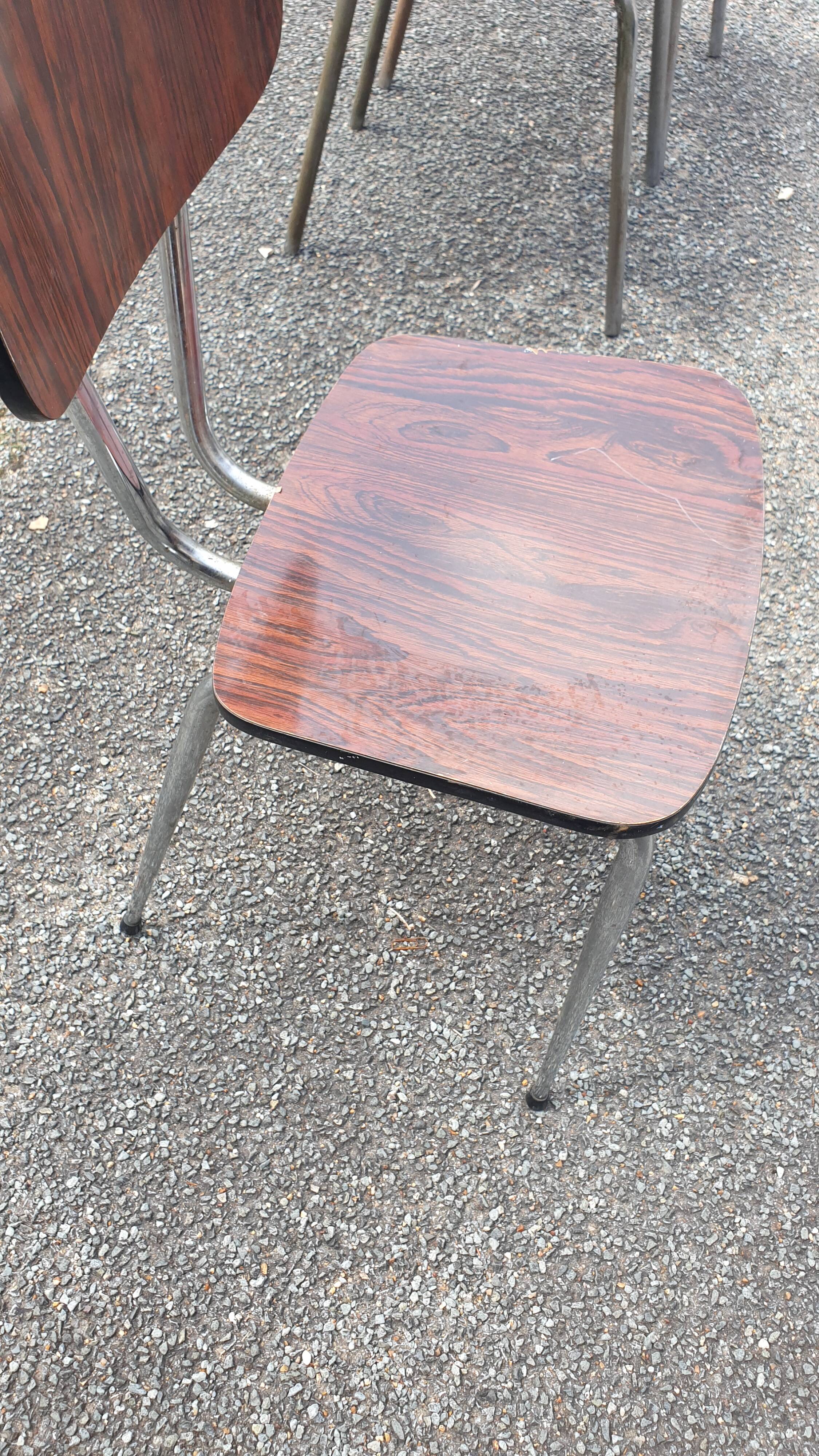 1 veined brown Formica chair