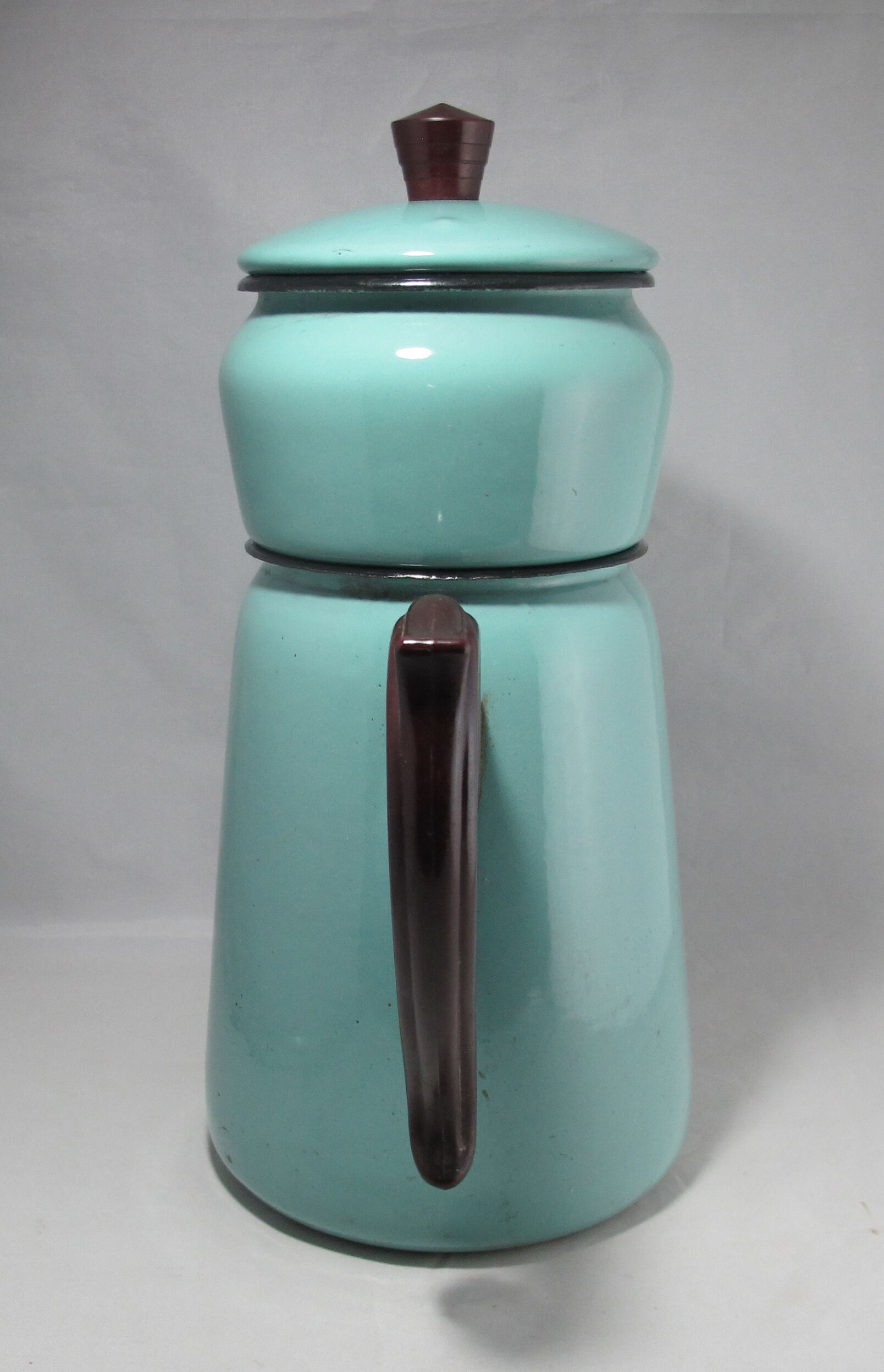 large vintage coffee maker made of enamelled sheet metal