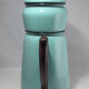 large vintage coffee maker made of enamelled sheet metal