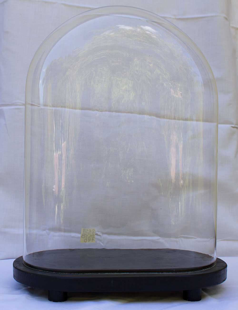 Old oval glass globe 35.5 cm high black foot