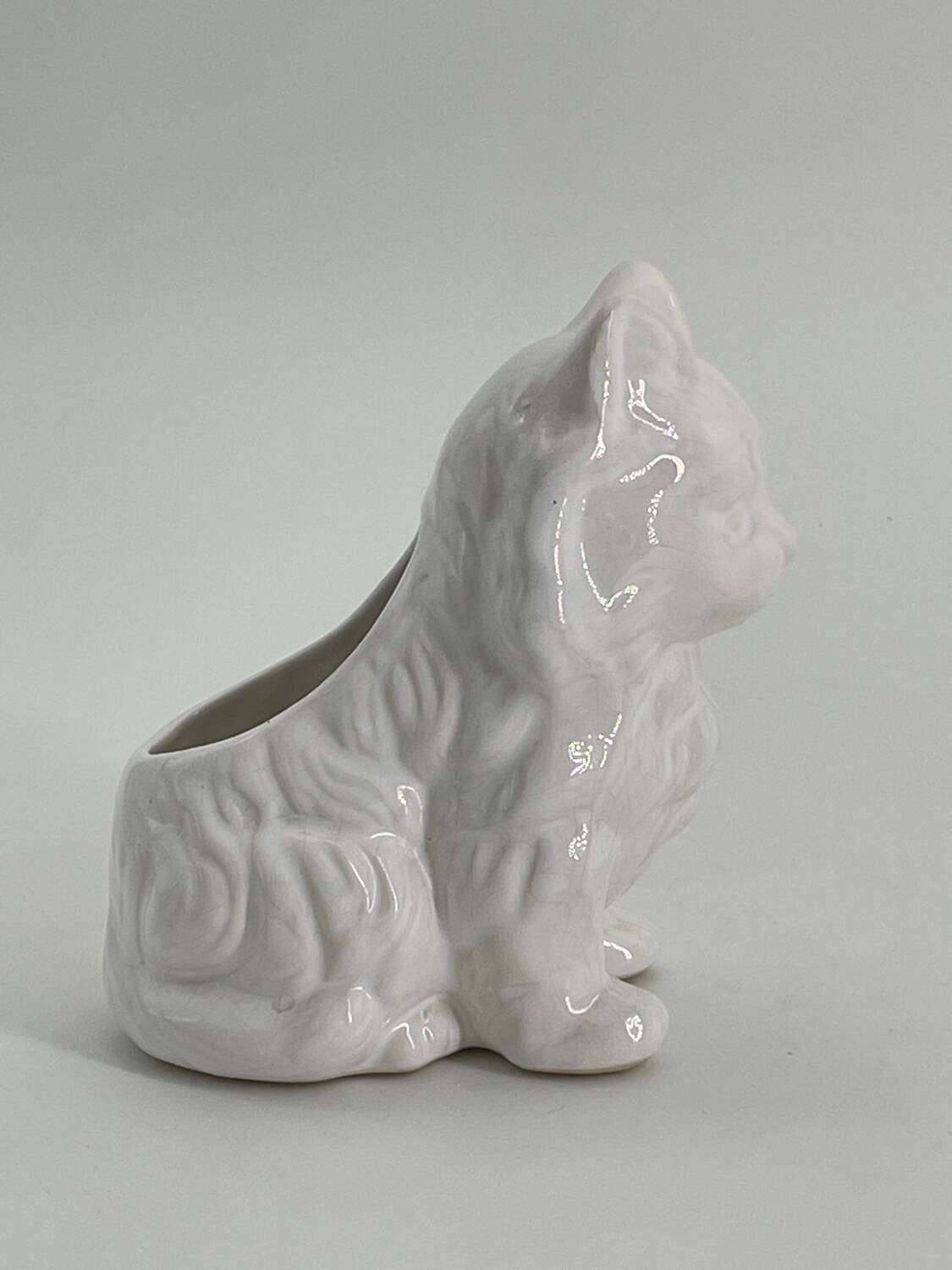 Vintage ceramic pot holder in the shape of a cat