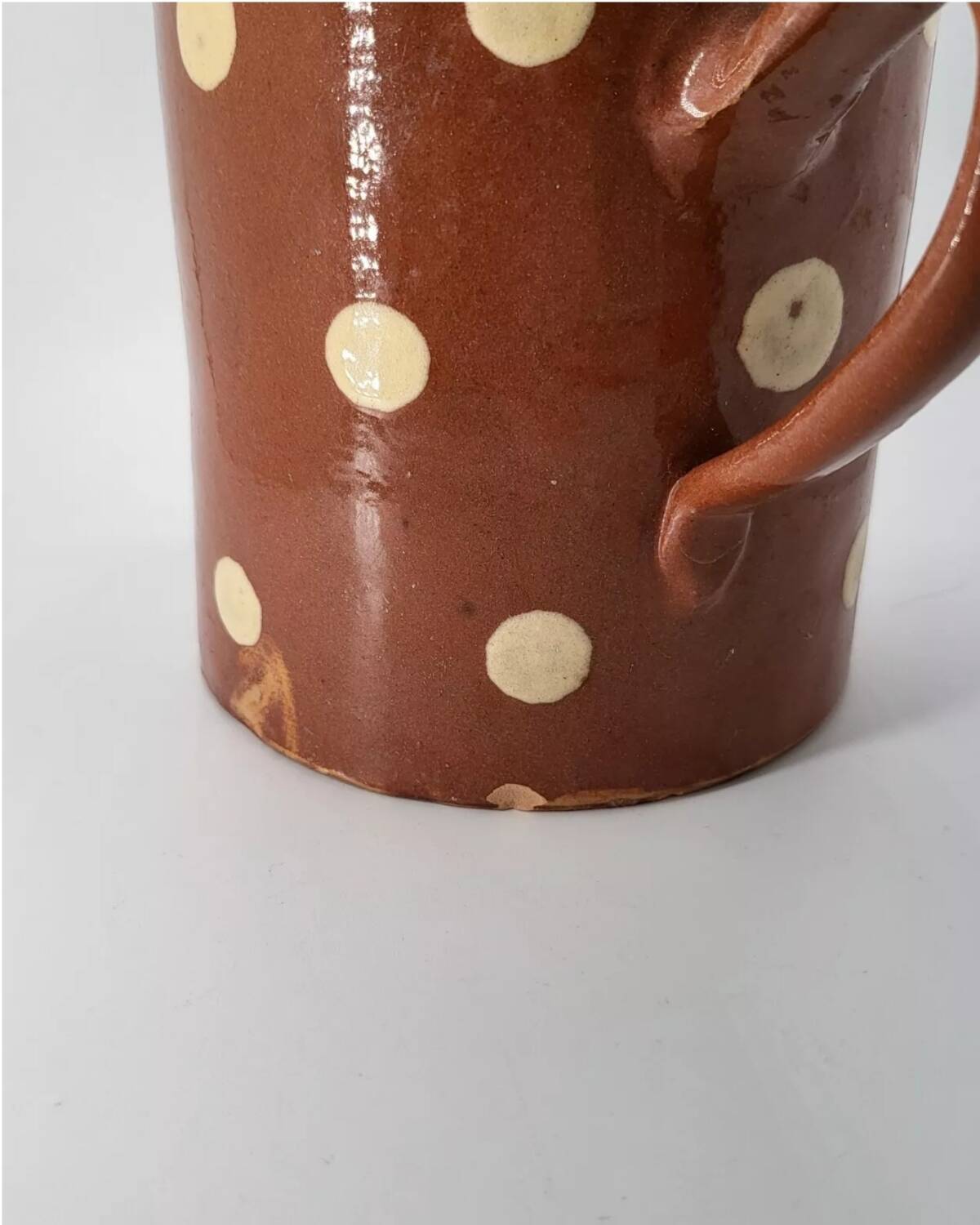 Old pitcher with polka dots savoyard pottery in glazed terracotta alsace