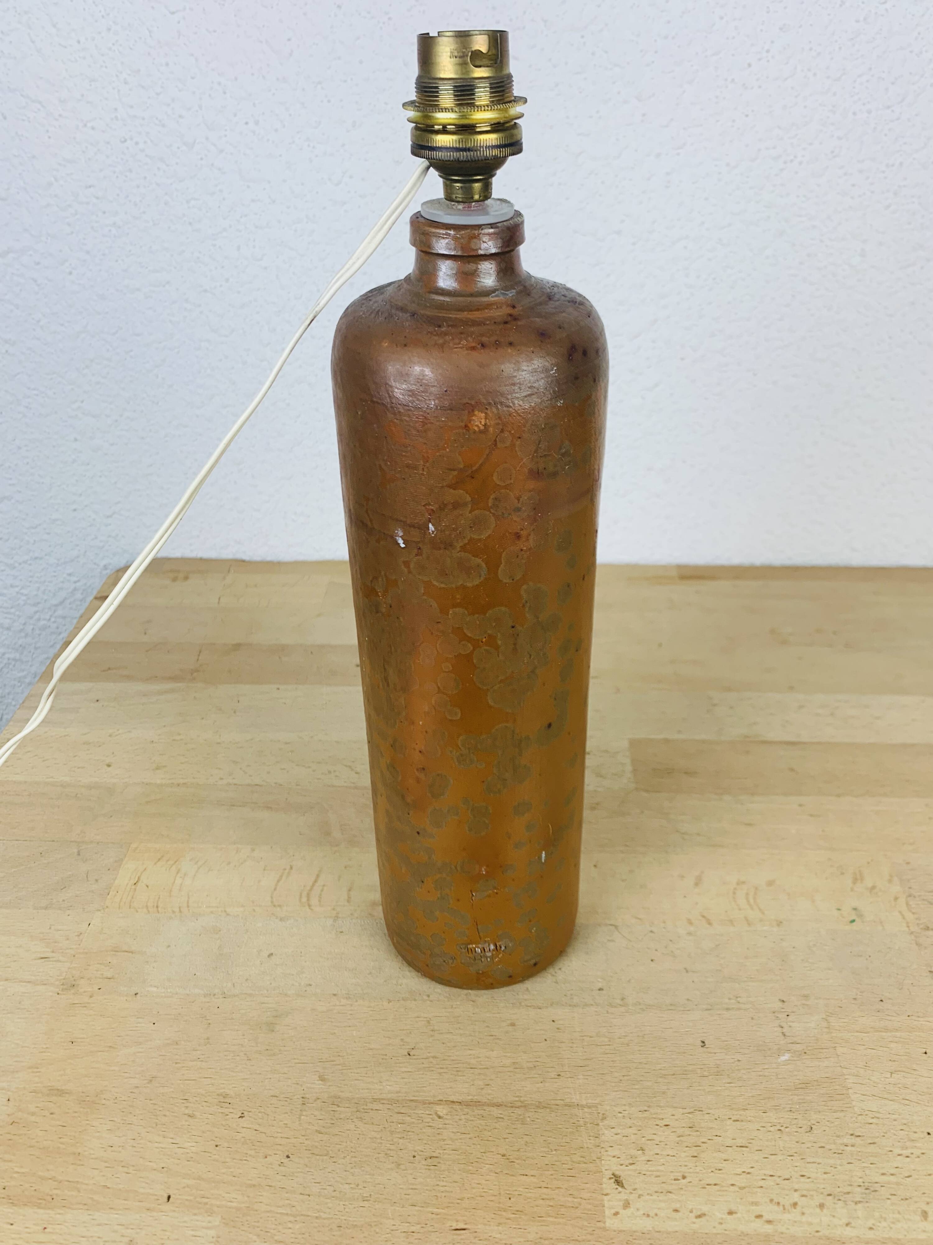 Stoneware bottle lamp and vintage wool lampshade