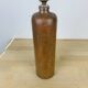 Stoneware bottle lamp and vintage wool lampshade