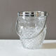 Vintage glass ice bucket stamped with a metal handle