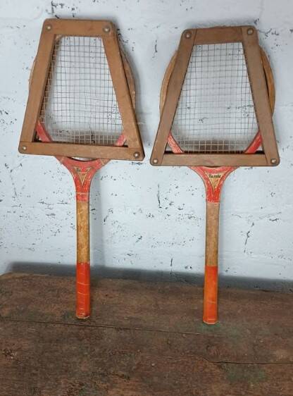Pair of vintage Majestic tennis rackets with press.