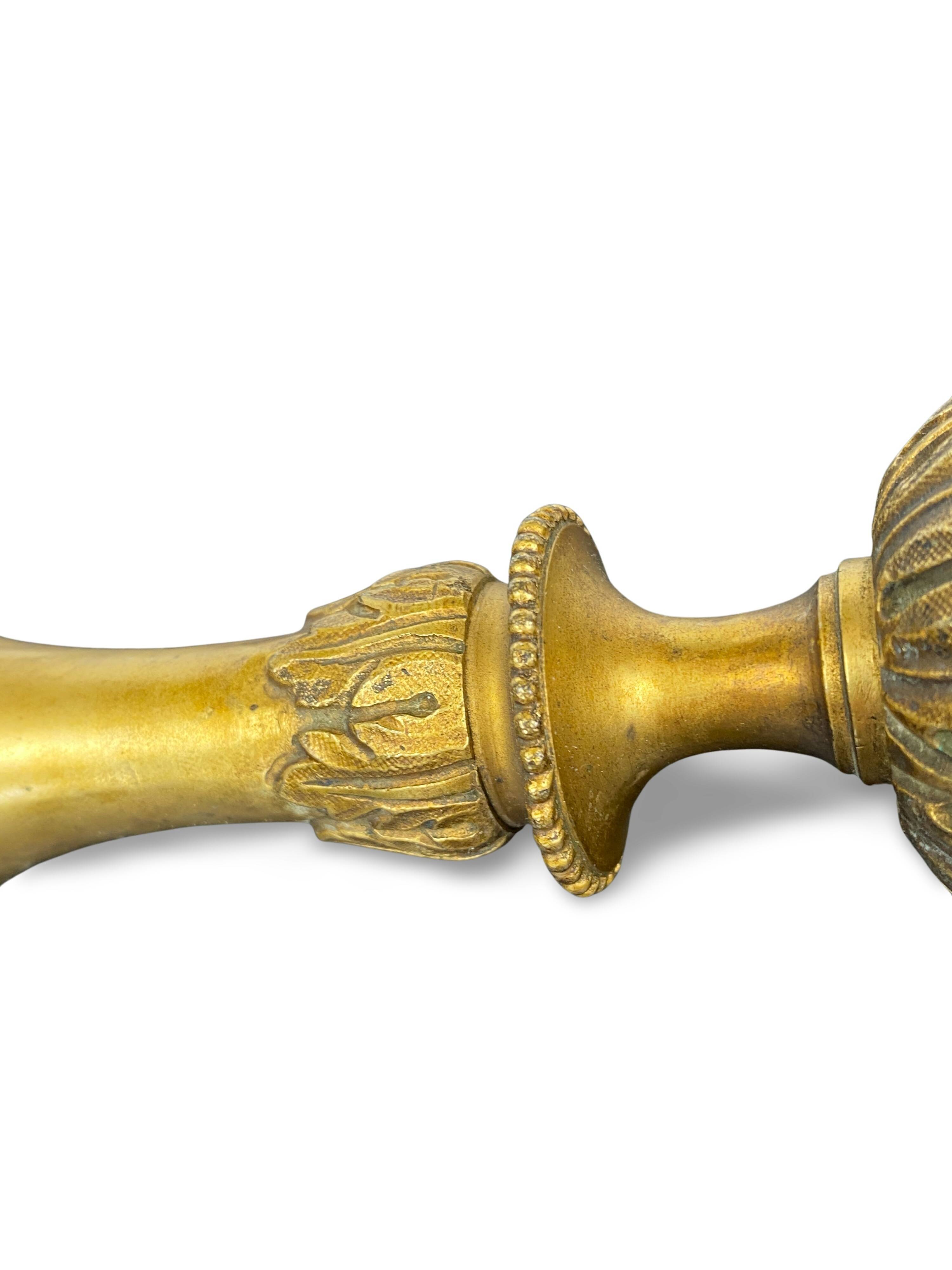 Louis XVI period candlestick in chiseled gilt bronze