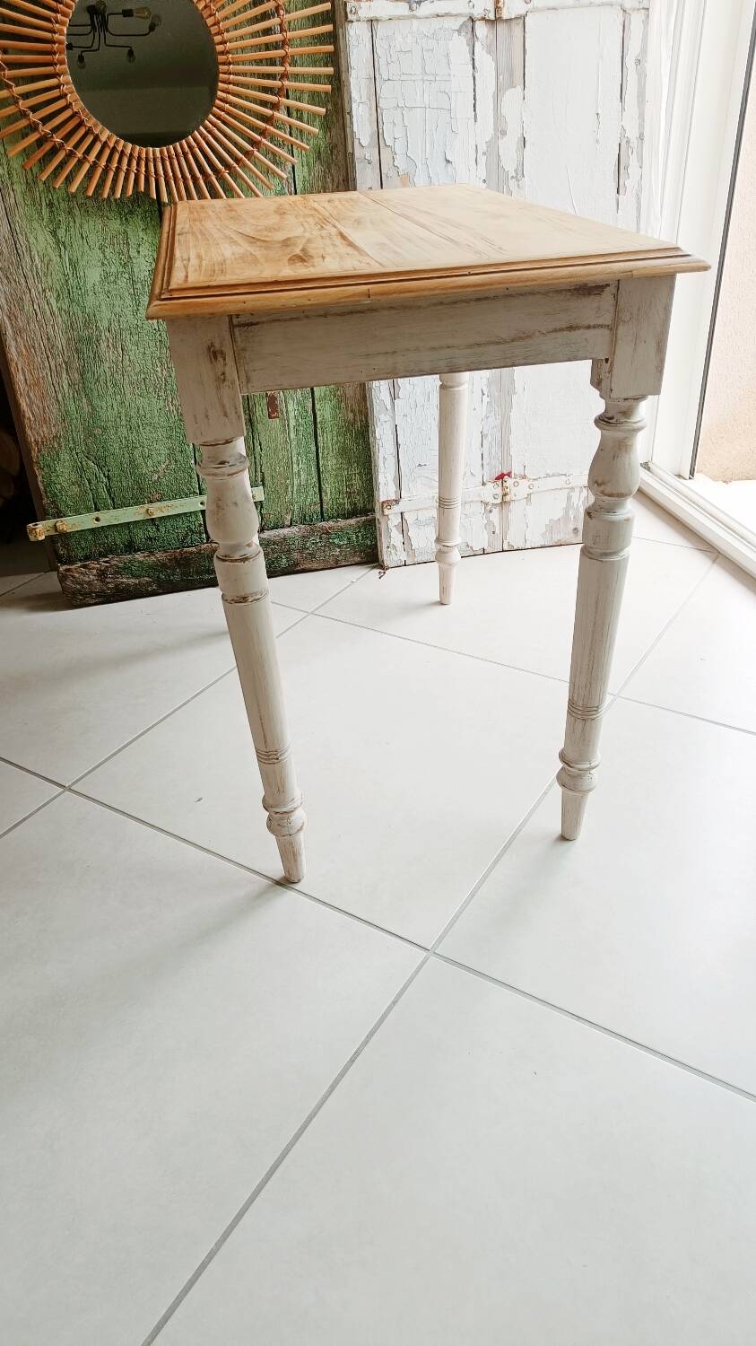 Antique wooden desk with a patinated base