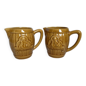 Pair of old Desvres barrel pitchers