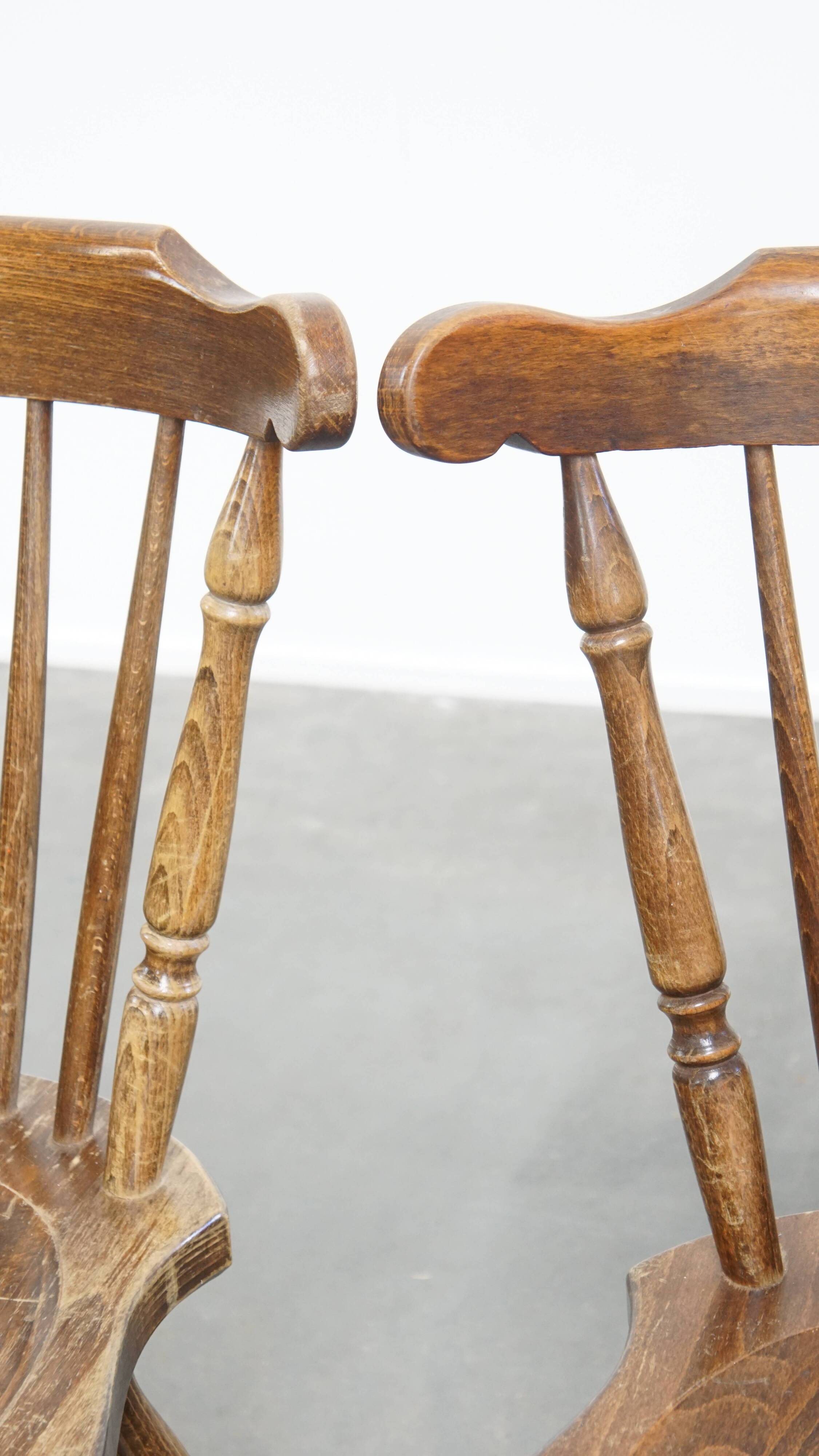 Set of 8 antique wooden spindle chairs