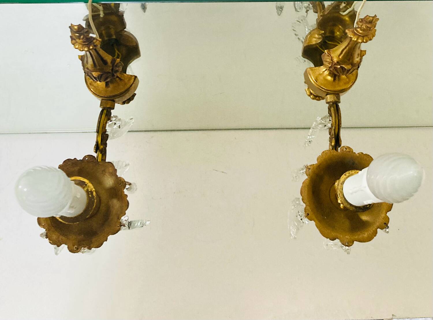 St Louis XV wall lights in gilded bronze with pendants from the mid-20th century.