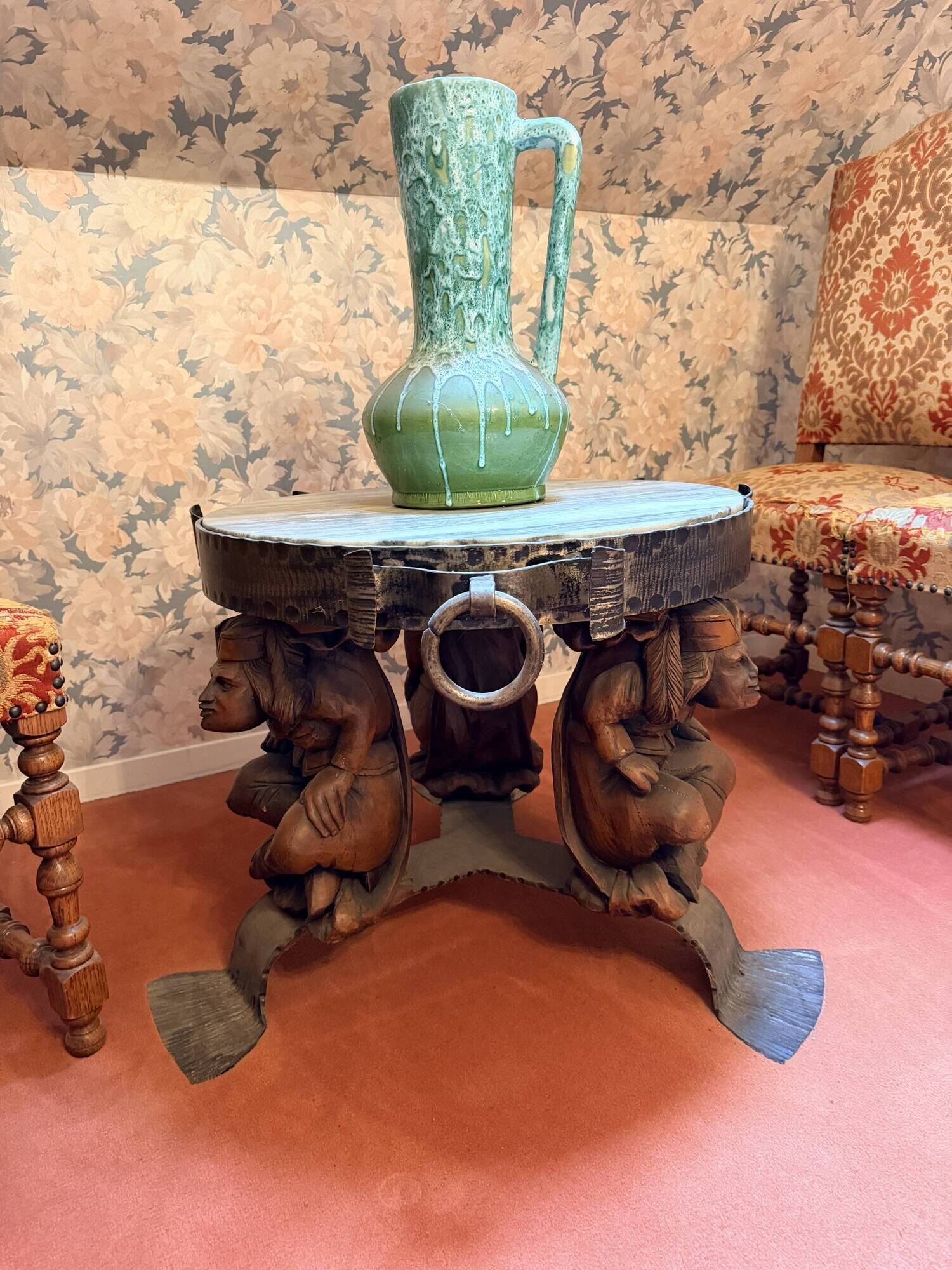 Wrought iron and hammered marble coffee table circa 1950.