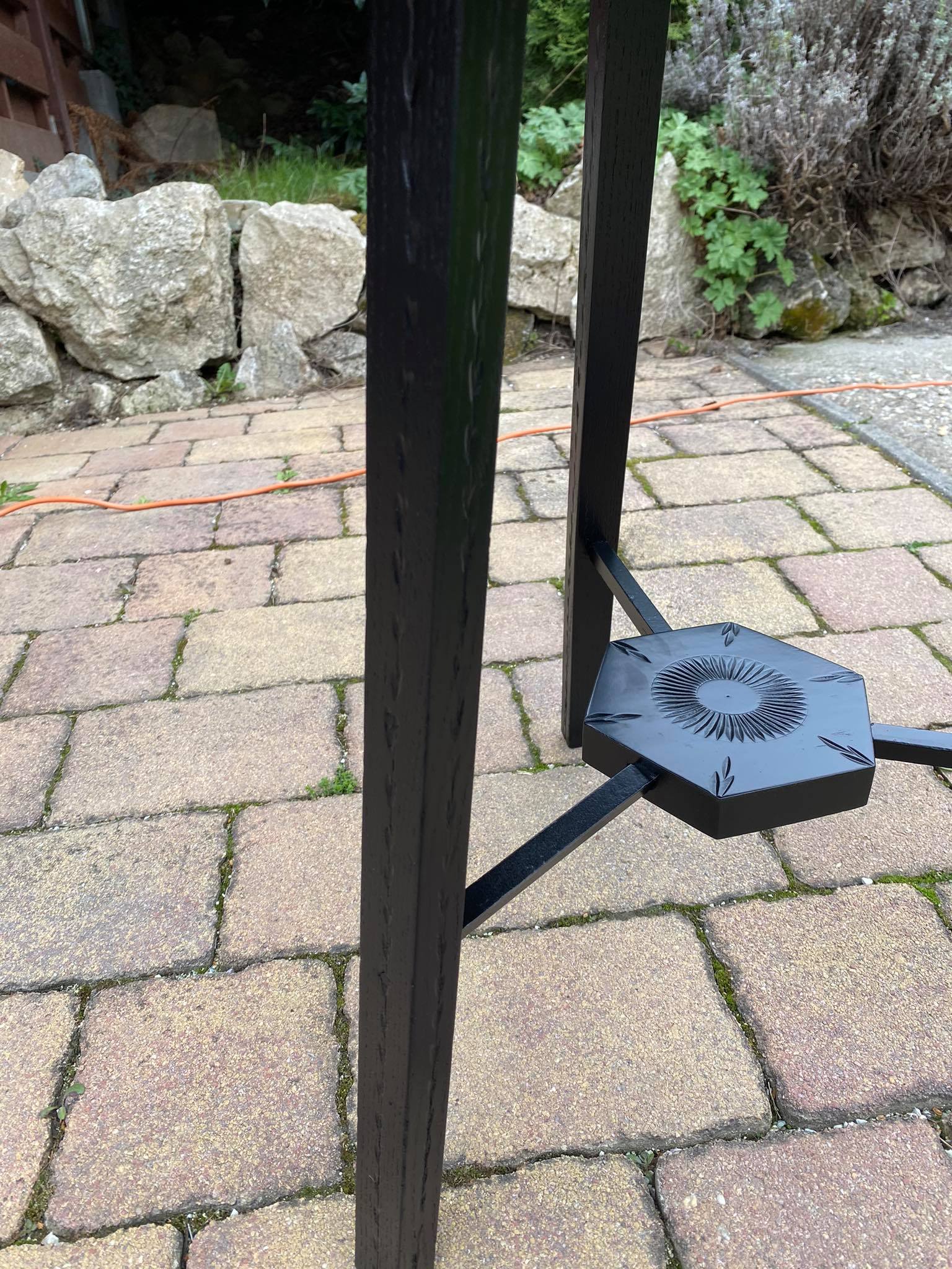 Hand painted black hexagon shaped occasional table.