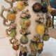 Large antique vase with relief decorations of coloured fruits.