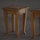 A pair of antique Danish pine stools from the late 19th century.