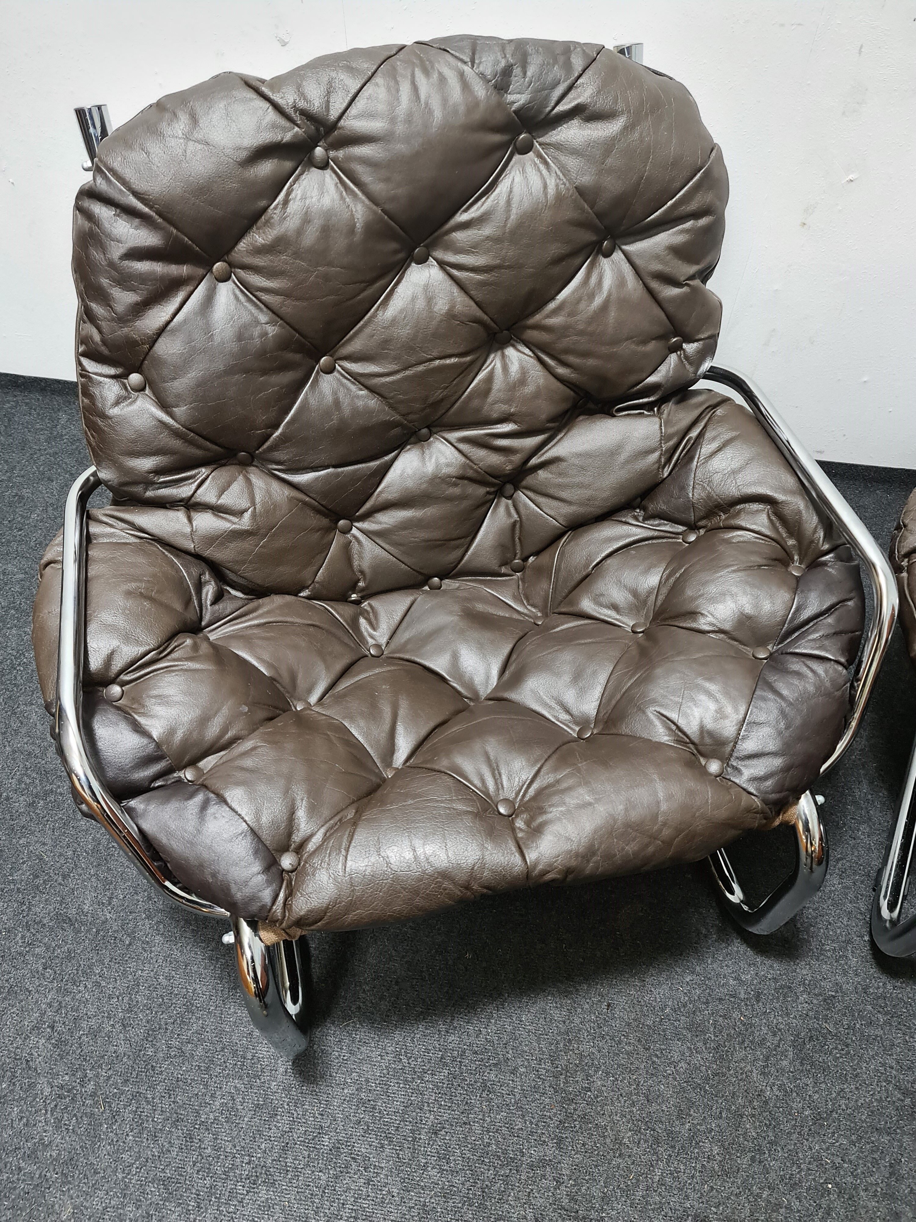 Pair of chrome and leather vintage chairs