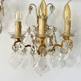 Pair of bronze wall lights and crystal pendants