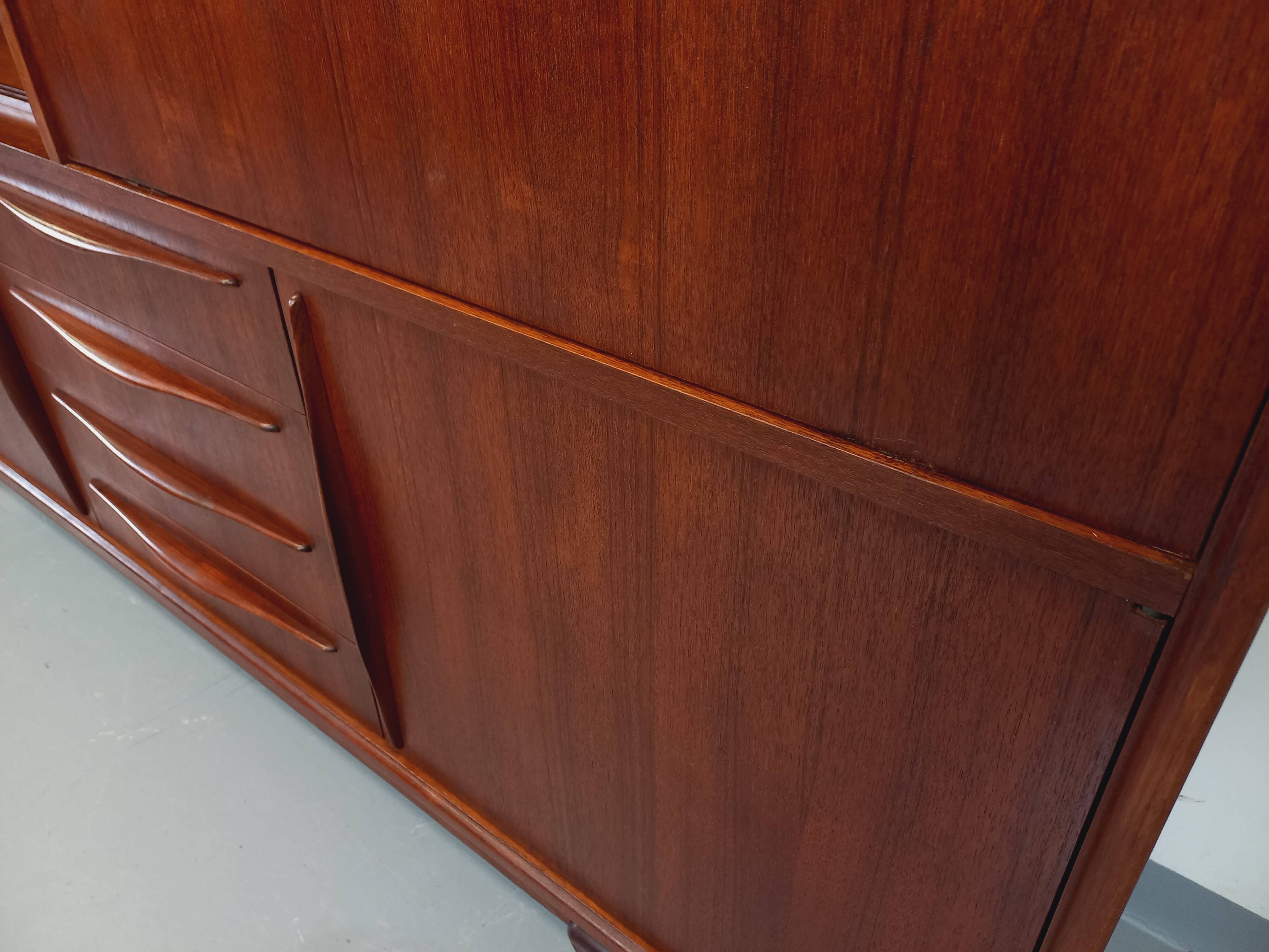 Vintage Scandinavian high sideboard in teak from the 50s and 60s