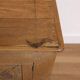 Oak side cabinet with carved motifs
