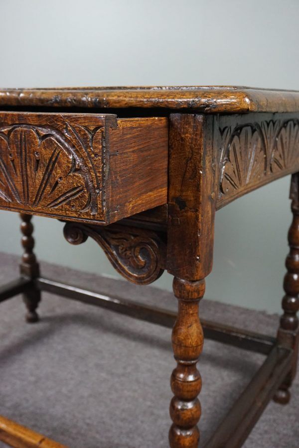 Carved antique English side table