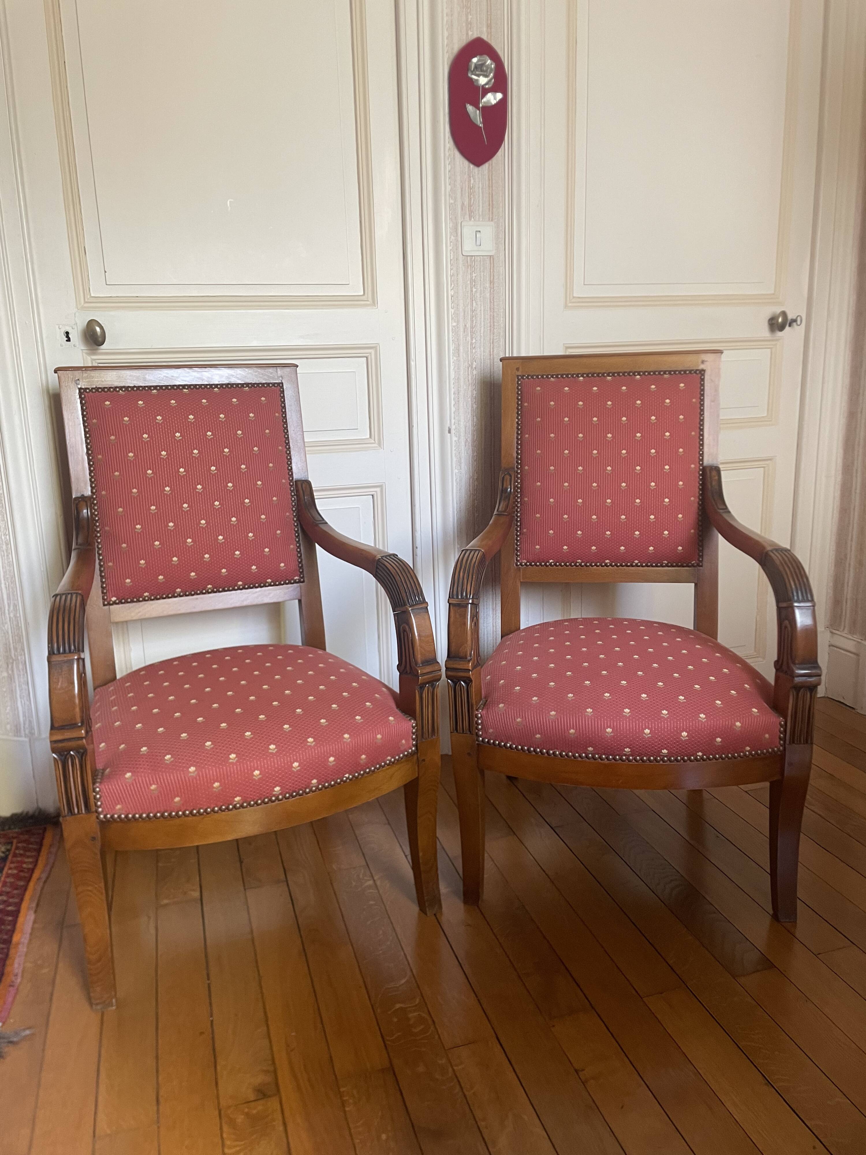 A pair of Directoire style armchairs.