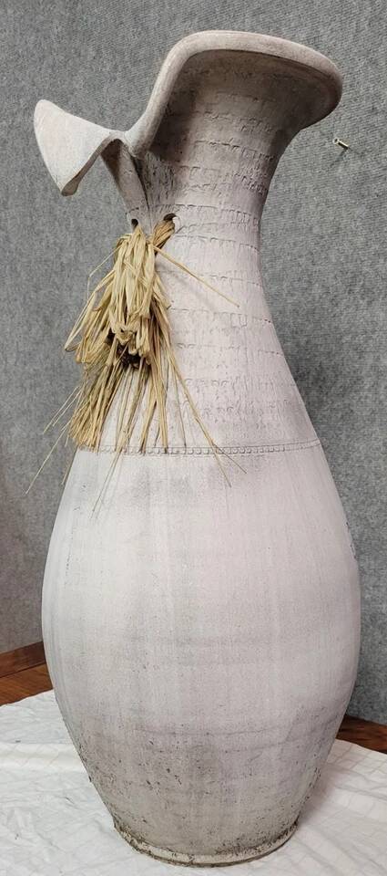 Vintage whitewashed pottery and wicker vase circa 1980