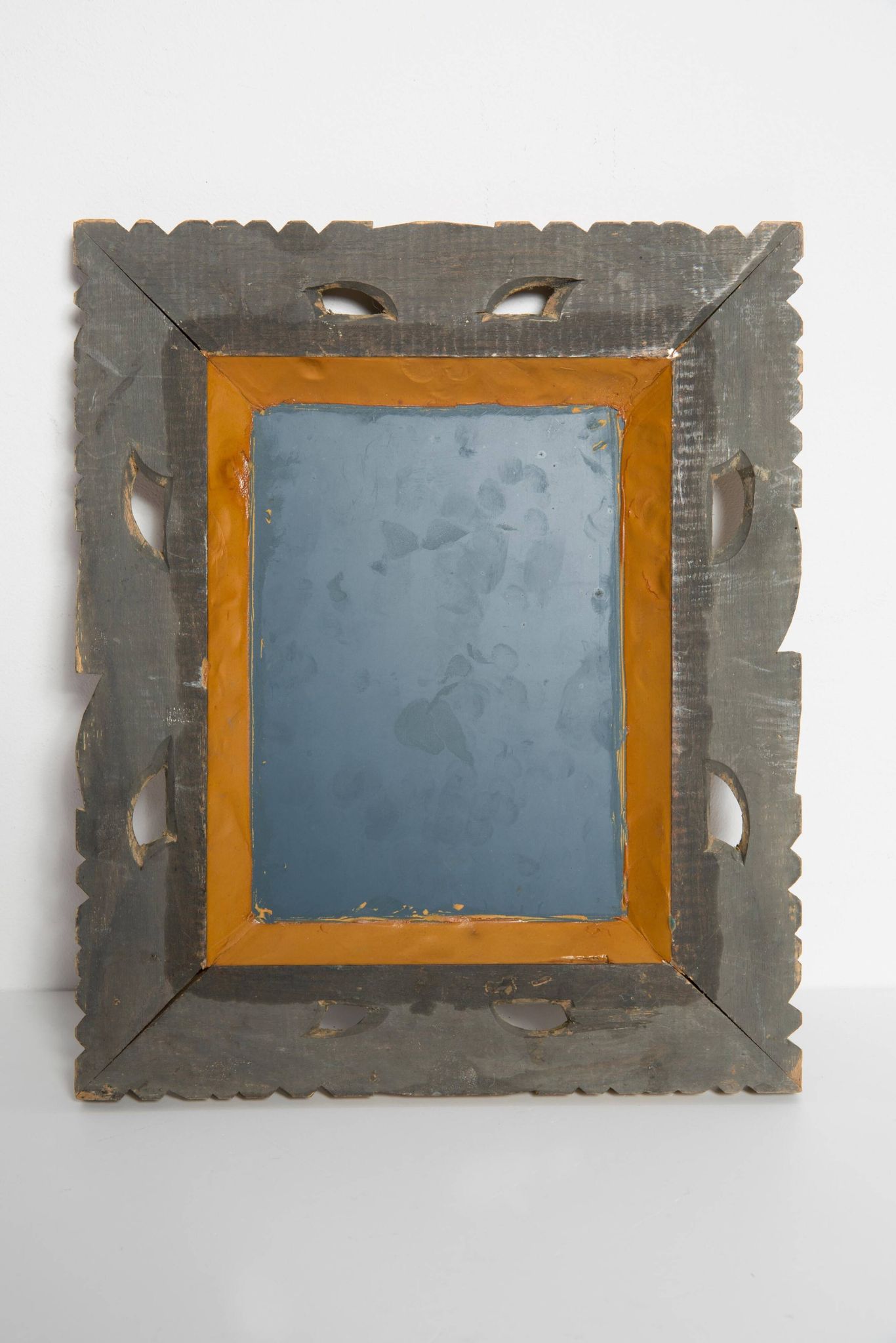 Decorative gold mirror mid-century in a wooden frame, Italy, 1960s.