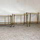 Trio of coffee tables "Nido" brass and glass Italy 70s