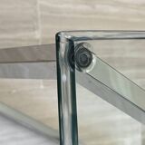 Vintage coffee table in glass and polished steel