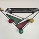 Wall-mounted coat rack attributed to Mathieu Matégot – France, 1950s