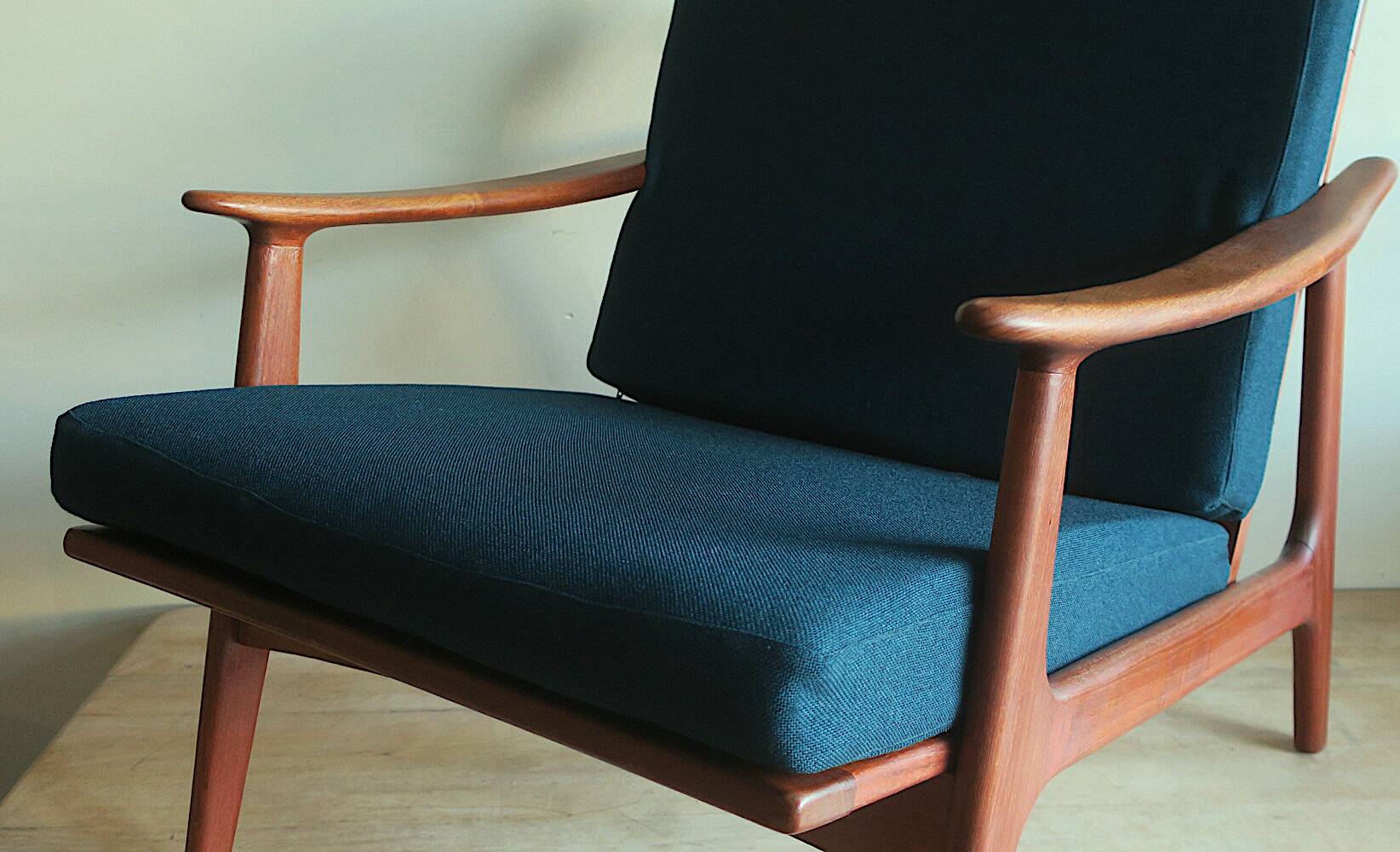 Danish teak lounge chair with blue-green cushions, 1960s