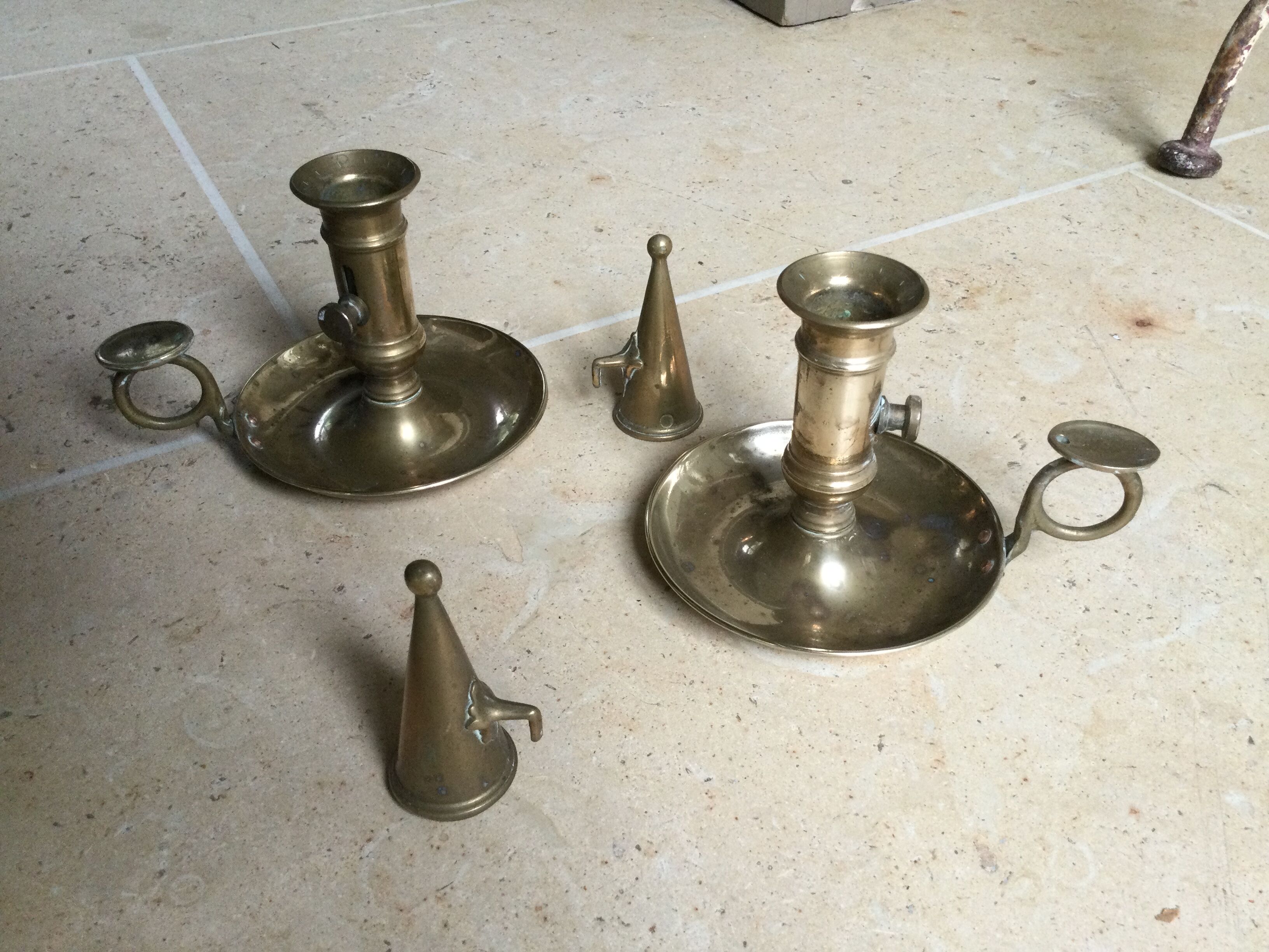 Pair of antique copper candle holders