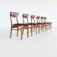 Set of six Danish dining chairs in teak and faux leather Denmark 1960