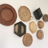 Wall composition of 9 wicker baskets and trays.