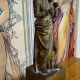 Ancient statue of the Virgin and Child in polychrome and gilded carved wood.