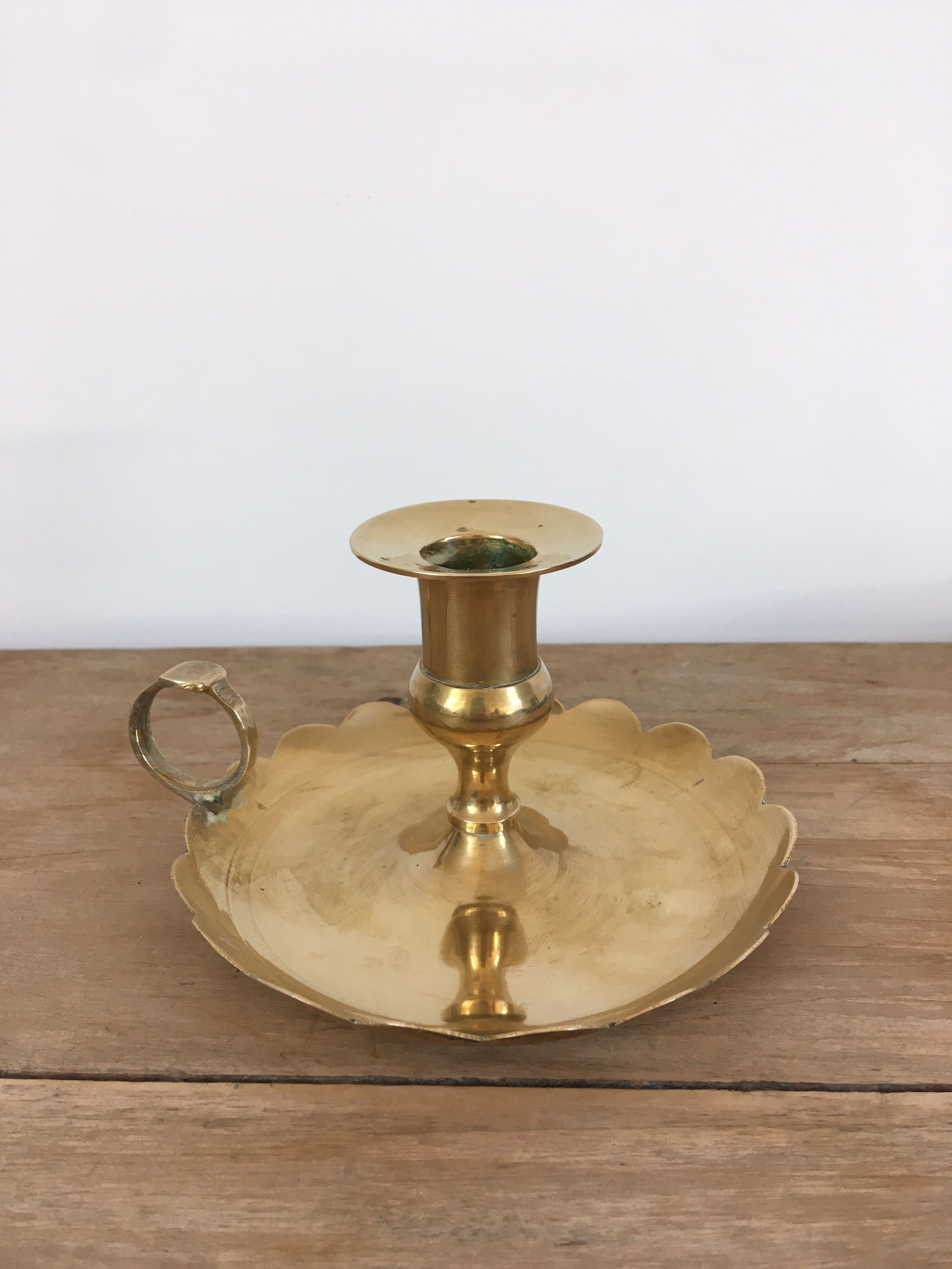 Brass cellar rat candle holder
