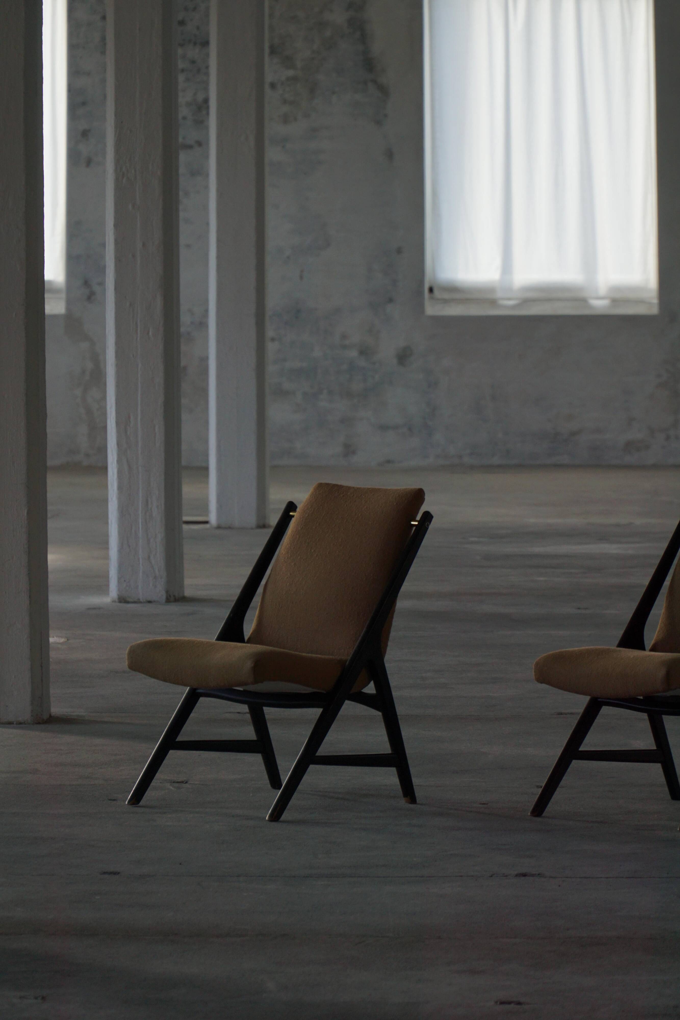Pair of armchairs from the 50s-60s in boucle, mid-century Swedish design.