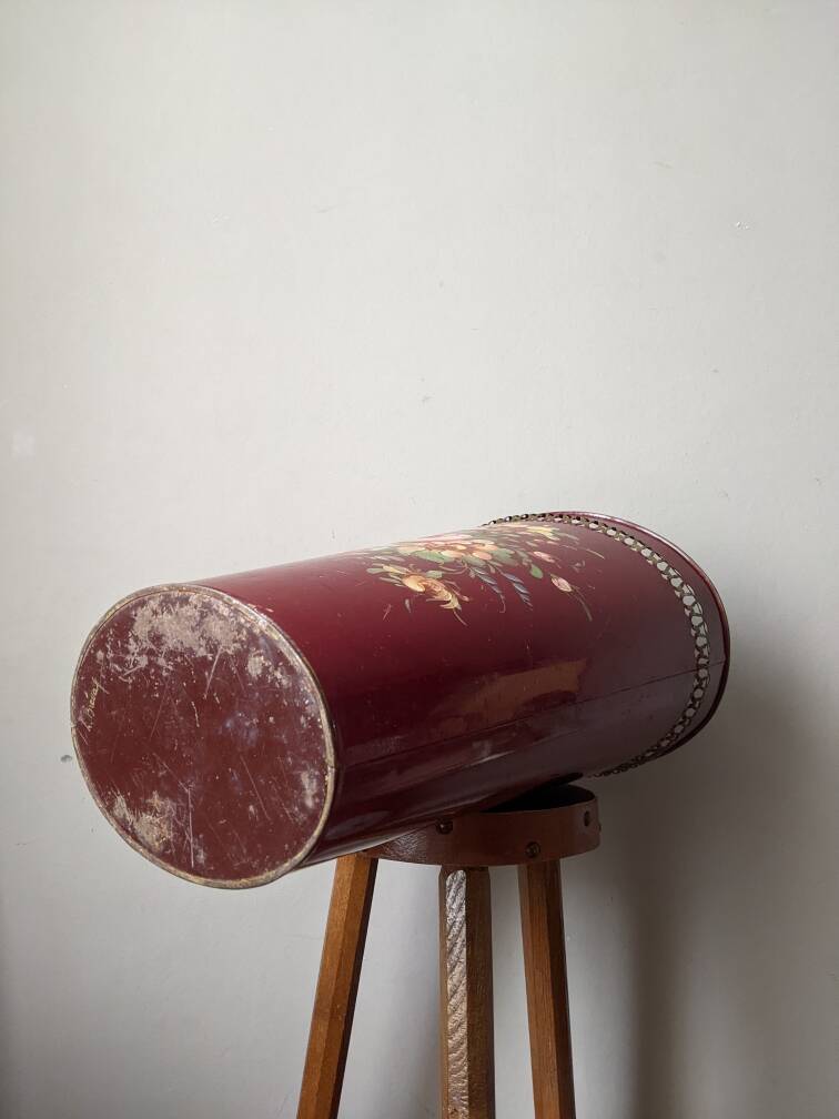 Antique metal umbrella stand with hand-painted floral decor, bohemian countryside