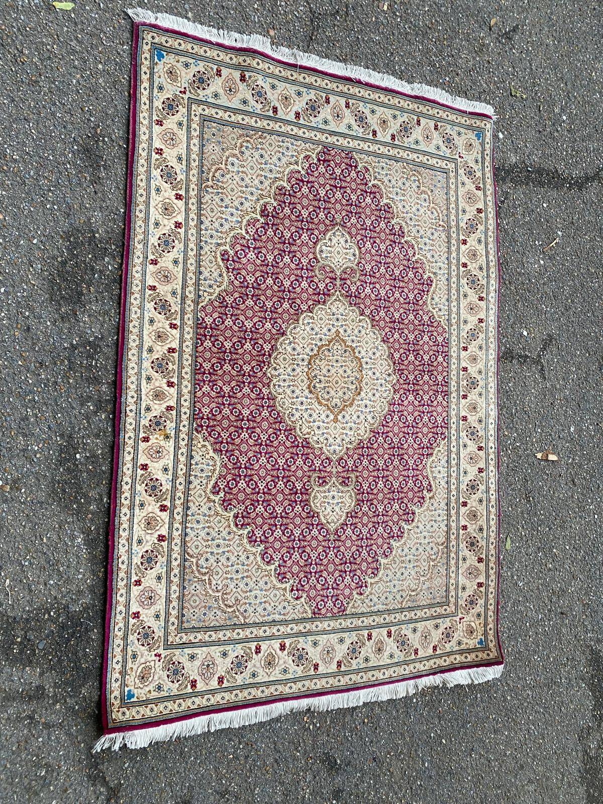 Handmade burgundy wool Persian rug 100x155cm