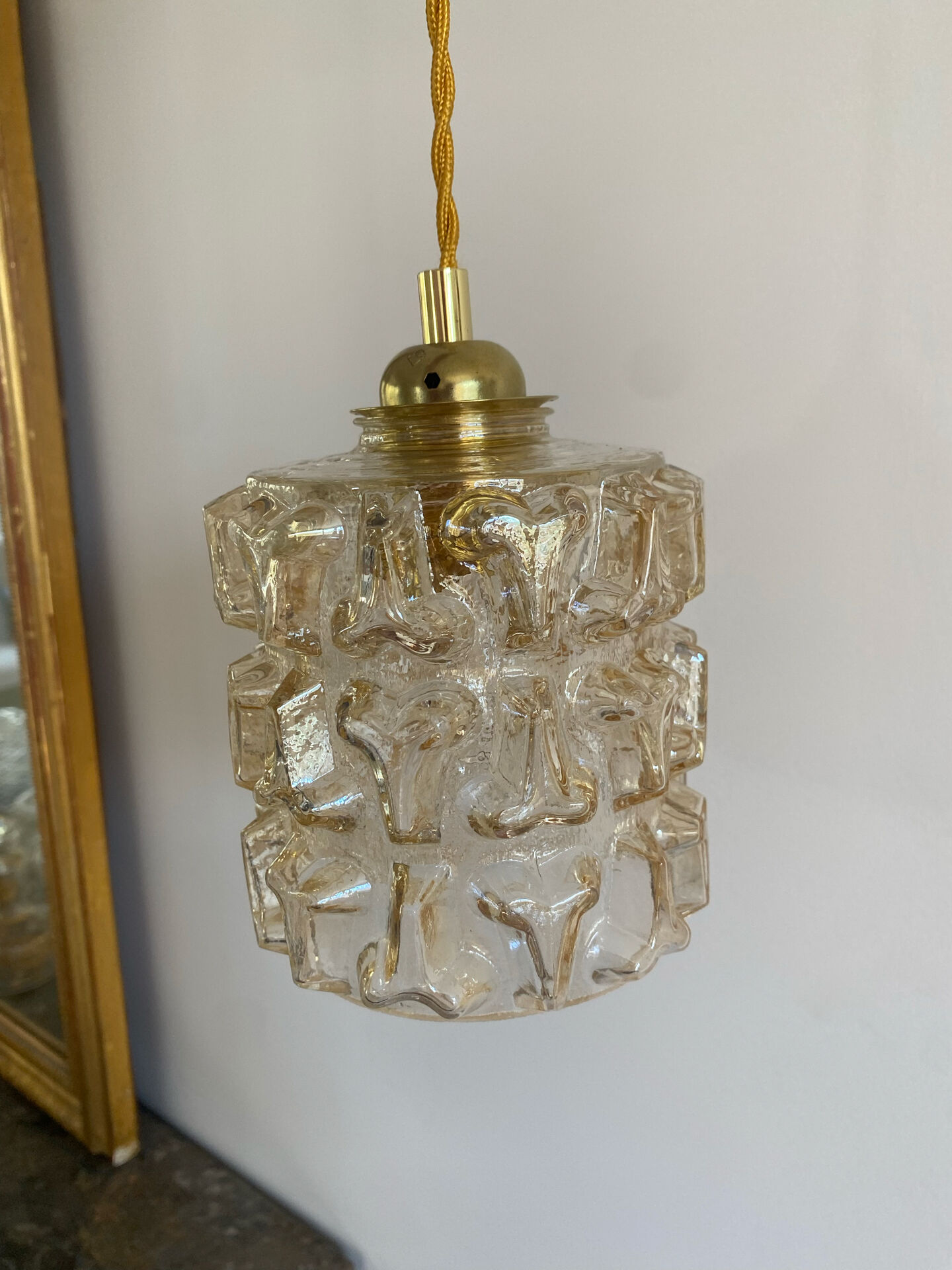 Vintage amber glass suspension globe