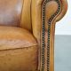 Fauteuil club vintage en cuir de mouton cognac clair