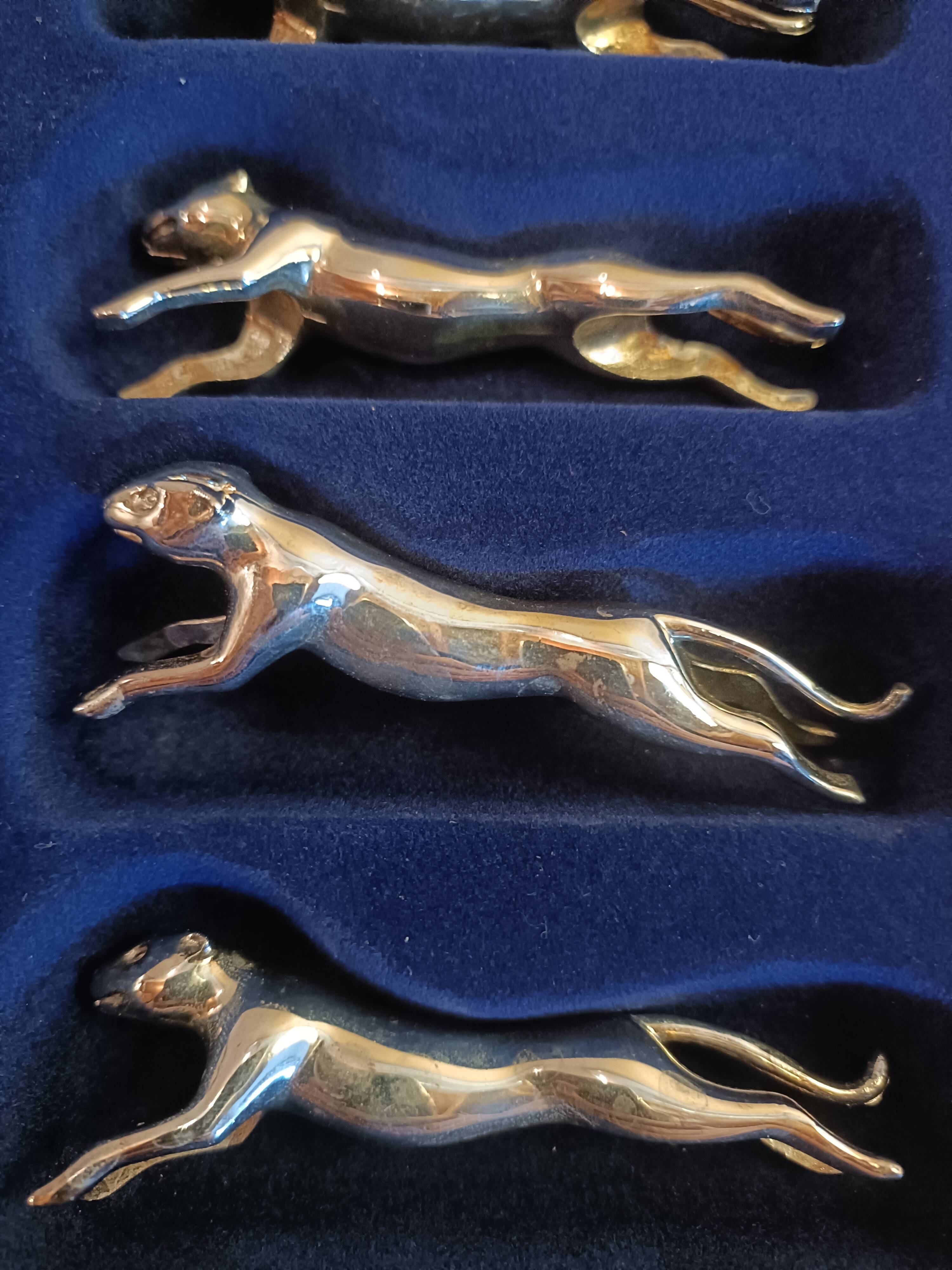 12 silver metal cat knife holders