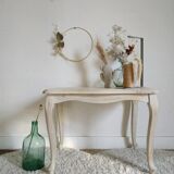 Old patinated coffee table and curved feet