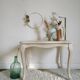 Old patinated coffee table and curved feet