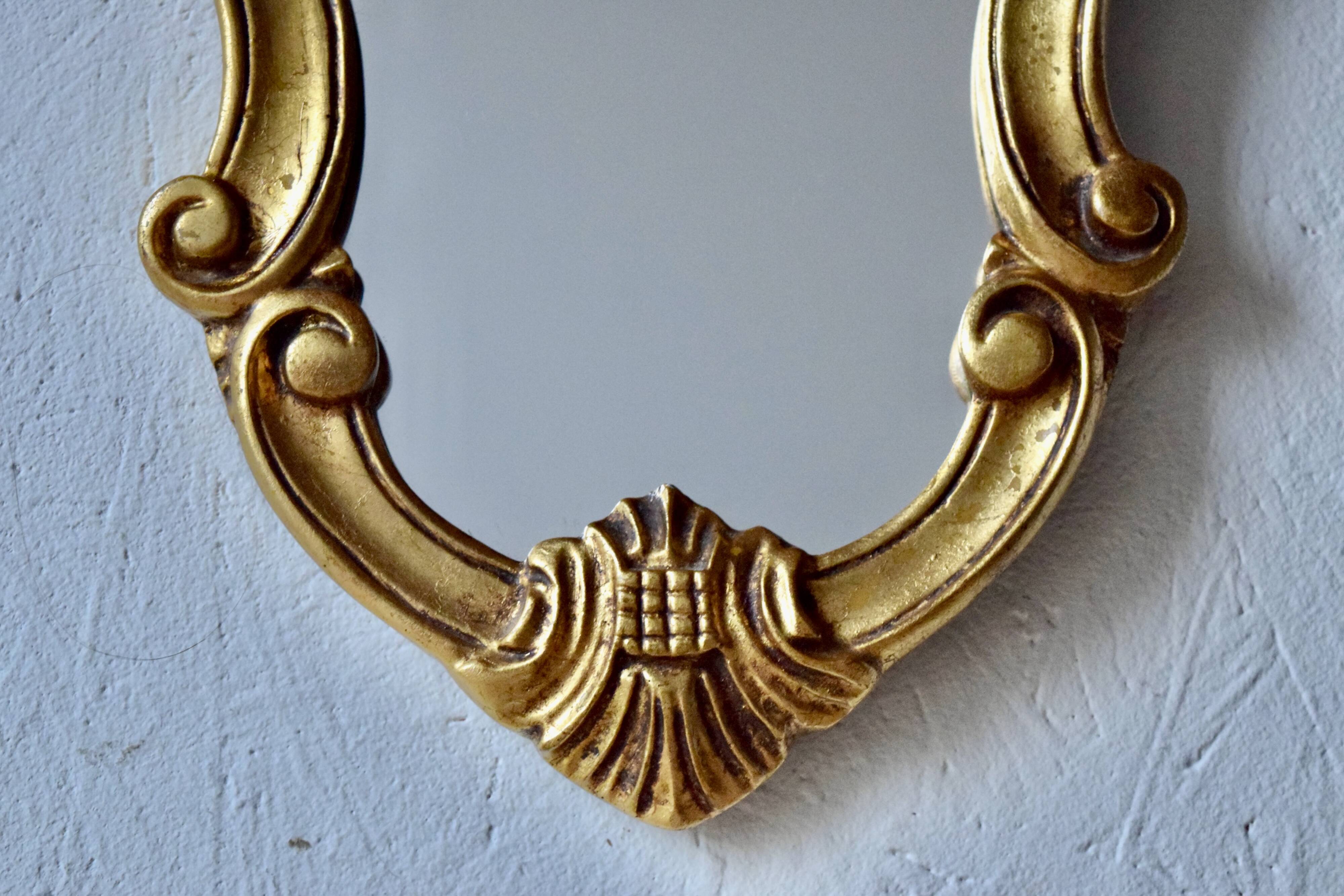 Old wall mirror in golden resin - rococo style